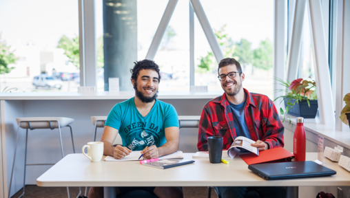 Two Men in the FVCC Library Smiling