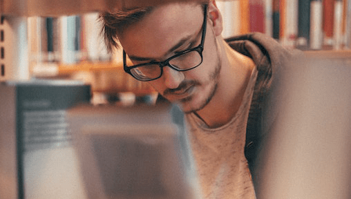 Male student in library