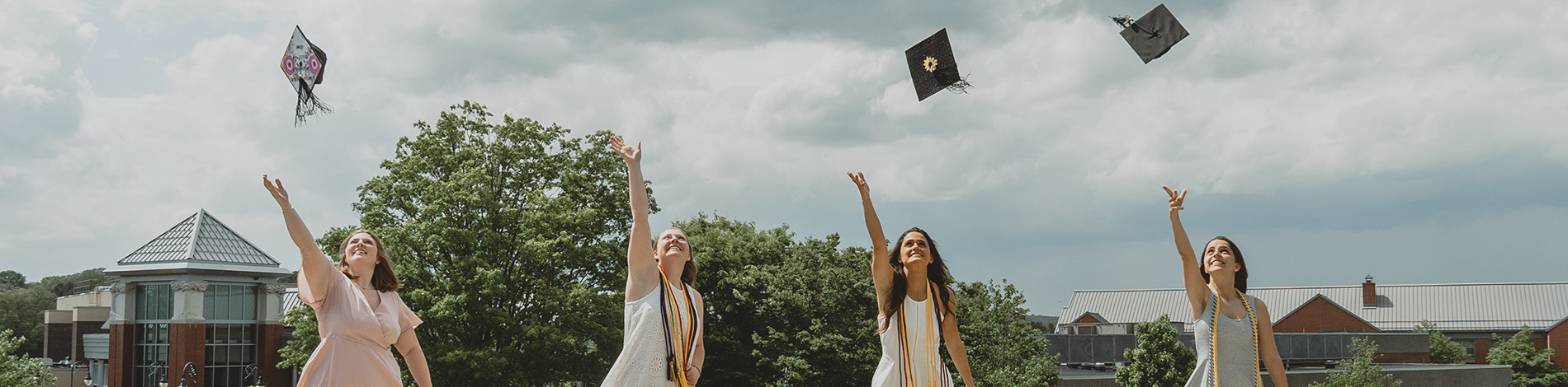 students celebrating graduation