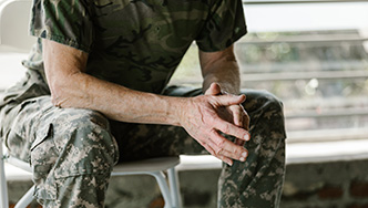 Image of US soldier sitting on bench